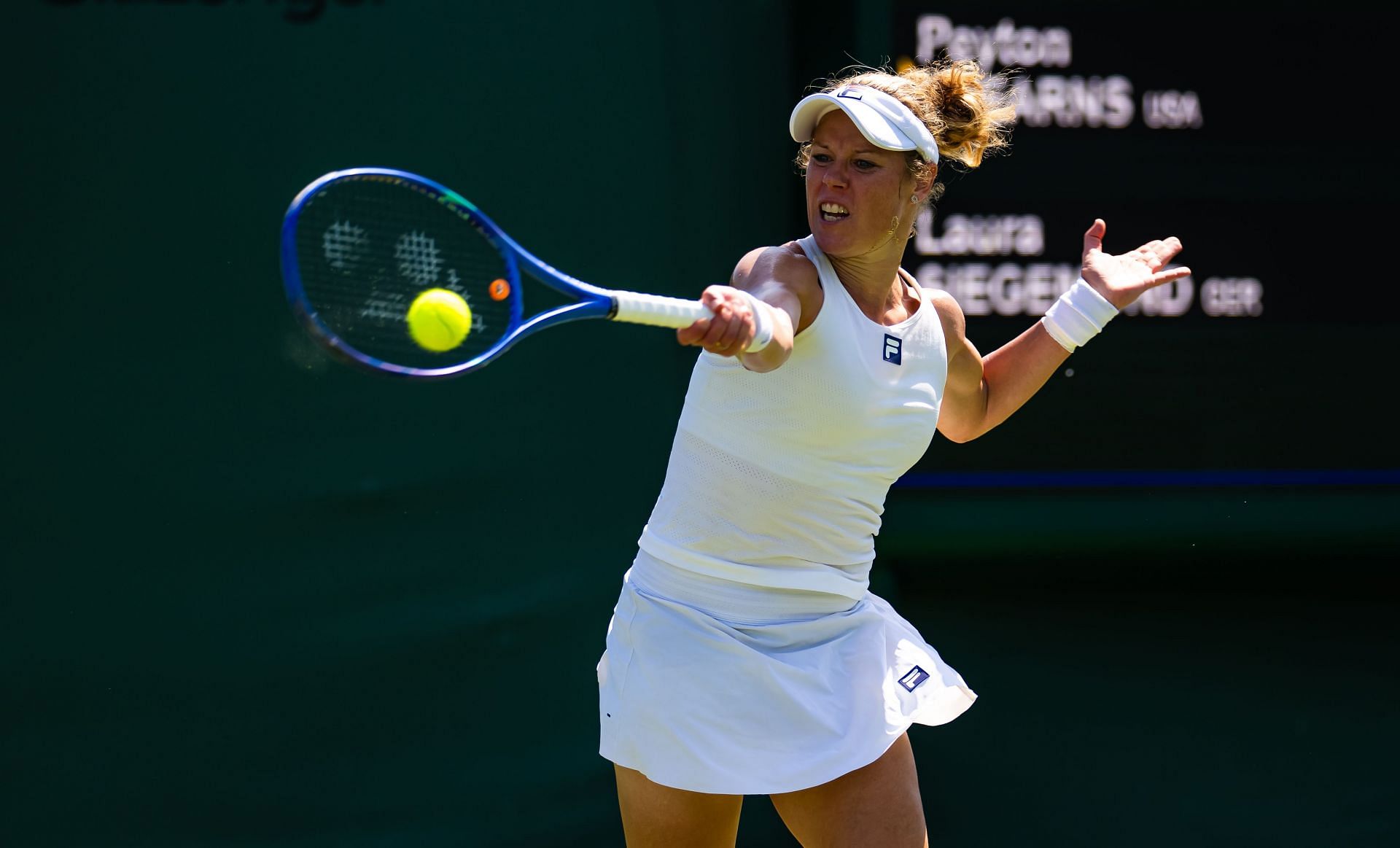 Laura Siegemund hits a forehand at Wimbledon | Image Source: Getty